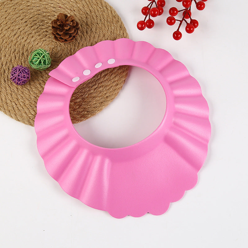 Bonnet de douche bébé imperméable, détail du matériau souple