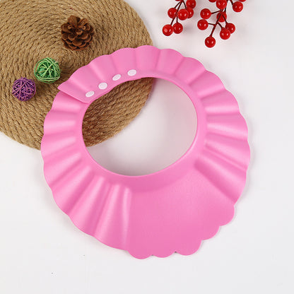 Bonnet de douche bébé imperméable, détail du matériau souple