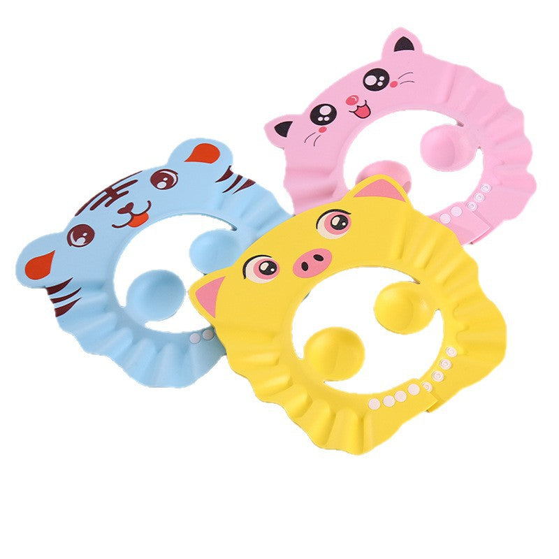 Bonnet de douche imperméable pour bébé porté pendant le bain